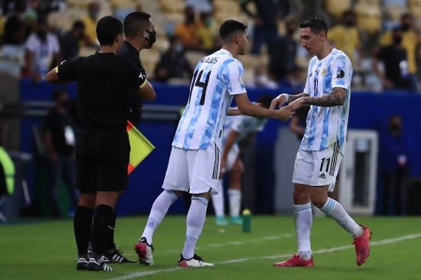 Angel Di Maria of Argentina is substituted by teammate Exequiel Palacios during the final of Copa America Brazil 2021 between Brazil and Argentina at...