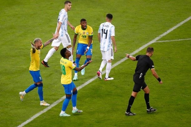 Neymar Jr. Of Brazil and teammates Vinicius Junior and Emerson react against Referee Esteban Ostojich during the final of Copa America Brazil 2021...