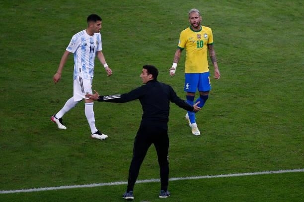 Head coach of Argentina Lionel Scaloni, Neymar Jr. Of Brazil and Exequiel Palacios of Argentina react during the final of Copa America Brazil 2021...