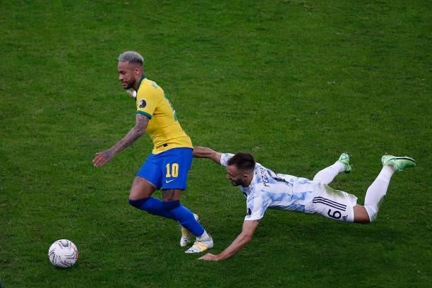 Neymar Jr. Of Brazil fights for the ball with German Pezzella of Argentina during the final of Copa America Brazil 2021 between Brazil and Argentina...