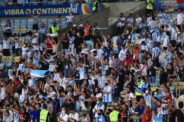 Fans of Argentina cheer their team during the final of Copa America Brazil 2021 between Brazil and Argentina at Maracana Stadium on July 10, 2021 in...