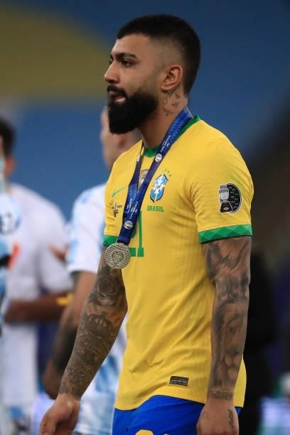 Gabriel Barbosa of Brazil reacts after receiving the second place medal after the final of Copa America Brazil 2021 between Brazil and Argentina at...