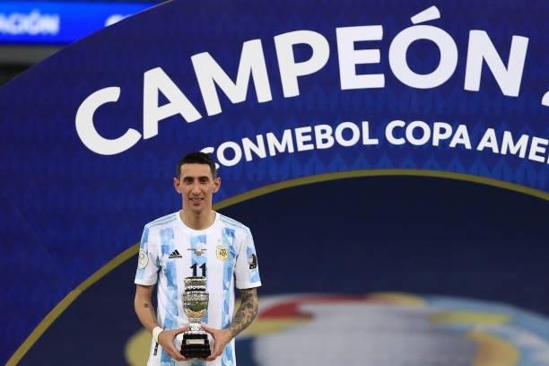 Angel Di Maria of Argentina celebrates with Man of the Match trophy after wining the final of Copa America Brazil 2021 between Brazil and Argentina...