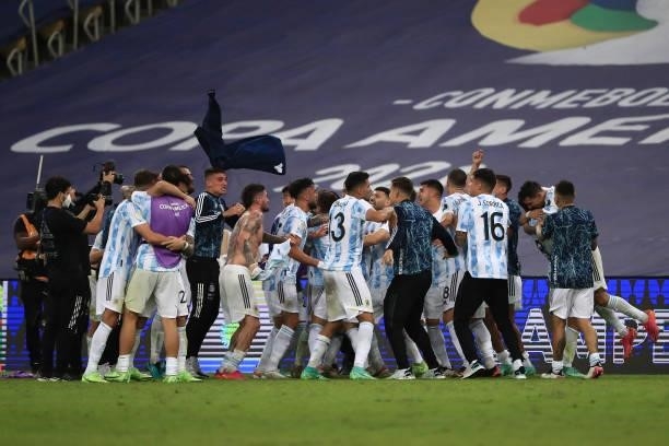 Cristian Romero of Argentina and teammates celebrate after winning the final of Copa America Brazil 2021 between Brazil and Argentina at Maracana...