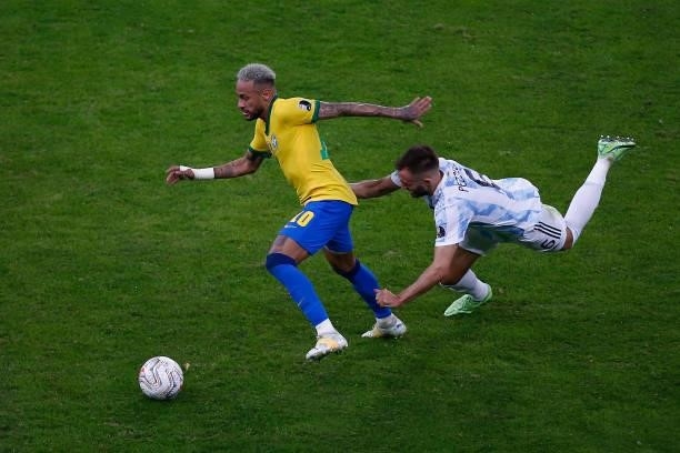 Neymar Jr. Of Brazil controls the ball against German Pezzella of Argentina during the final of Copa America Brazil 2021 between Brazil and Argentina...