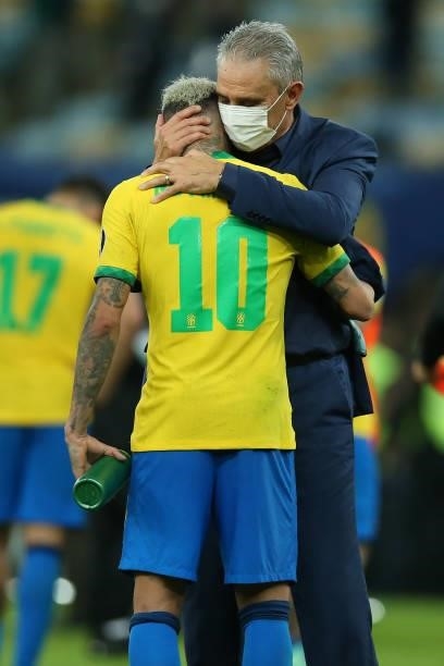 Tite head coach of Brazil comforts Neymar Jr. Of Brazil after the final of Copa America Brazil 2021 between Brazil and Argentina at Maracana Stadium...