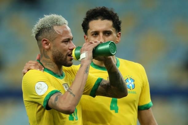 Neymar Jr. Of Brazil is comforted by teammate Marquinhos after the final of Copa America Brazil 2021 between Brazil and Argentina at Maracana Stadium...
