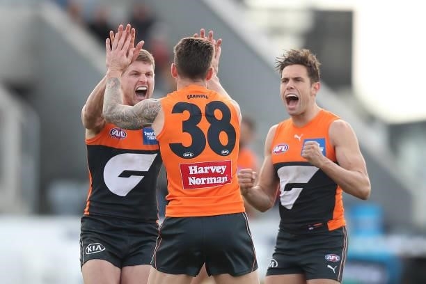 Daniel Lloyd of the Giants celebrates kicking a goal during the round 17 AFL match between Greater Western Sydney Giants and Gold Coast Suns at Mars...