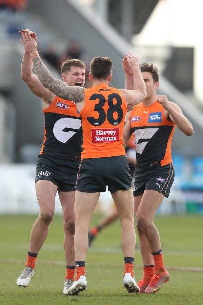 Daniel Lloyd of the Giants celebrates kicking a goal during the round 17 AFL match between Greater Western Sydney Giants and Gold Coast Suns at Mars...