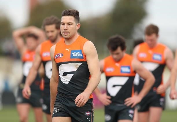 The Giants look dejected following the round 17 AFL match between Greater Western Sydney Giants and Gold Coast Suns at Mars Stadium on July 11, 2021...