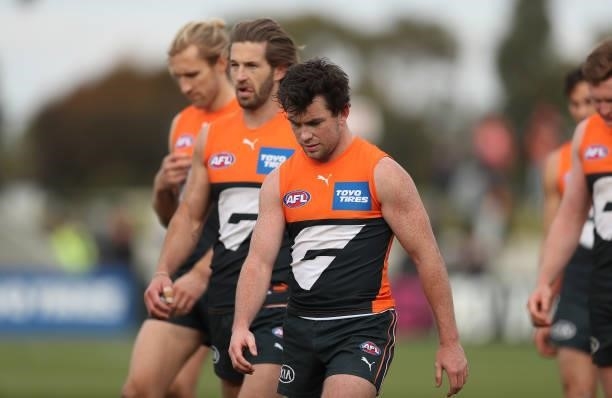 The Giants look dejected following the round 17 AFL match between Greater Western Sydney Giants and Gold Coast Suns at Mars Stadium on July 11, 2021...