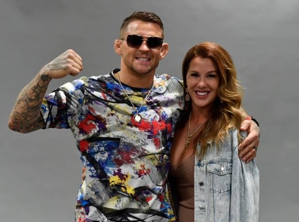 Dustin Poirier poses for a portrait with his wife, Jolie, after his victory during the UFC 264 event at T-Mobile Arena on July 10, 2021 in Las Vegas,...