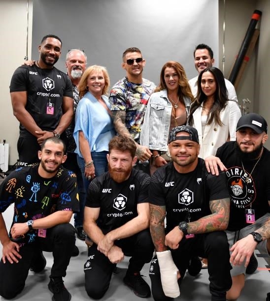 Dustin Poirier poses for a portrait with his family and team after his victory during the UFC 264 event at T-Mobile Arena on July 10, 2021 in Las...