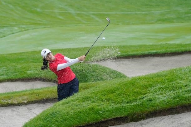 Kotone Hori of Japan hits from a bunker on the 18th hole at the playoff second hole during the final round of the Nipponham Ladies Classic at Katsura...