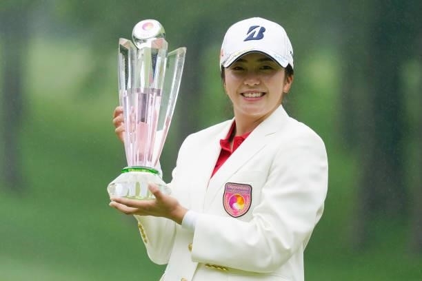 Kotone Hori of Japan poses with the trophy after winning the Nipponham Ladies Classic at Katsura Golf Club on July 11, 2021 in Tomakomai, Hokkaido,...