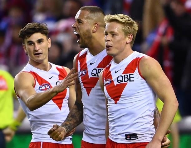 Lance Franklin of the Swans is congratulated by team mates after kicking a goal during the round 17 AFL match between Western Bulldogs and Sydney...