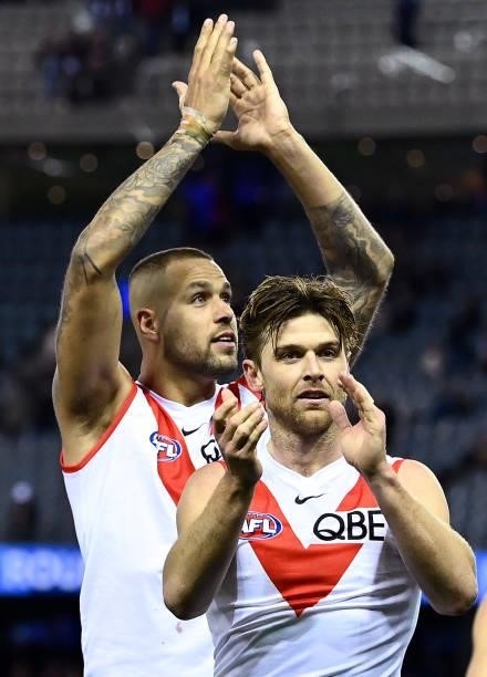 Lance Franklin and Dane Rampe of the Swans celebrate winning the round 17 AFL match between Western Bulldogs and Sydney Swans at Marvel Stadium on...