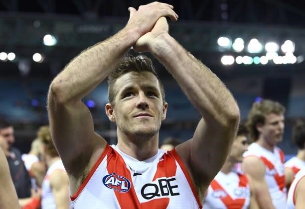 Luke Parker and his Swans team mates celebrate winning the round 17 AFL match between Western Bulldogs and Sydney Swans at Marvel Stadium on July 11,...