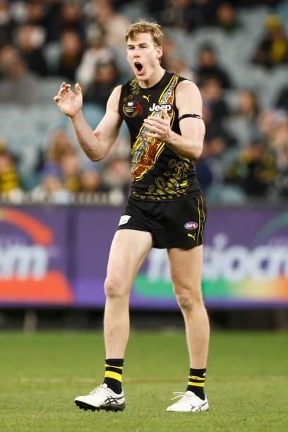 Tom J. Lynch of the Tigers celebrates a goal during the round 17 AFL match between Richmond Tigers and Collingwood Magpies at Melbourne Cricket...