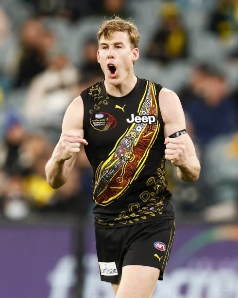 Tom J. Lynch of the Tigers celebrates a goal during the round 17 AFL match between Richmond Tigers and Collingwood Magpies at Melbourne Cricket...
