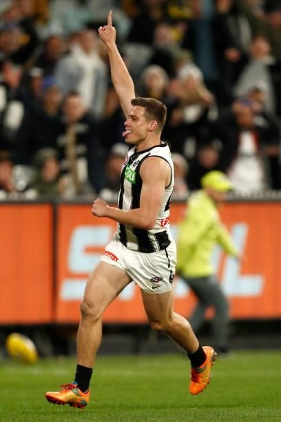 Josh Thomas of the Magpies celebrates a goal during the round 17 AFL match between Richmond Tigers and Collingwood Magpies at Melbourne Cricket...