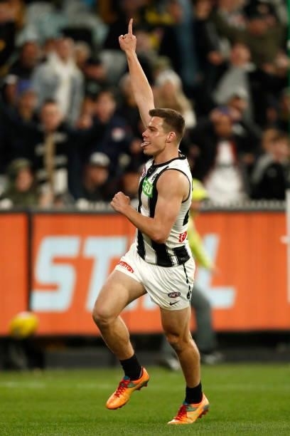 Josh Thomas of the Magpies celebrates a goal during the round 17 AFL match between Richmond Tigers and Collingwood Magpies at Melbourne Cricket...