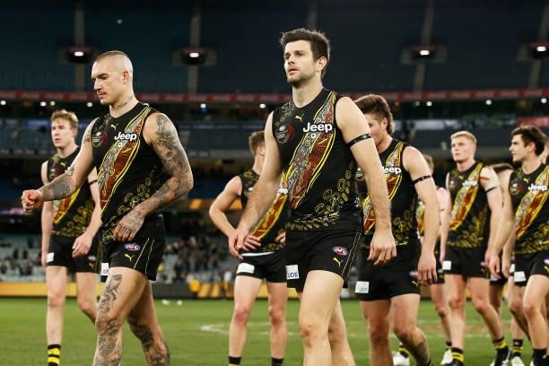 Dustin Martin of the Tigers and Trent Cotchin of the Tigers look dejected after defeat in the round 17 AFL match between Richmond Tigers and...