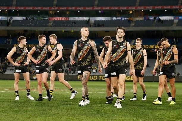 Dustin Martin of the Tigers and Trent Cotchin of the Tigers look dejected after defeat in the round 17 AFL match between Richmond Tigers and...