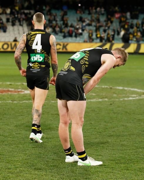 Dustin Martin of the Tigers and Jack Riewoldt of the Tigers look dejected after defeat in the round 17 AFL match between Richmond Tigers and...