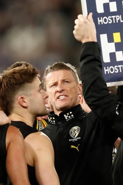 Richmond senior coach, Damien Hardwick speaks to his player at the 3/4 time huddle during the round 17 AFL match between Richmond Tigers and...