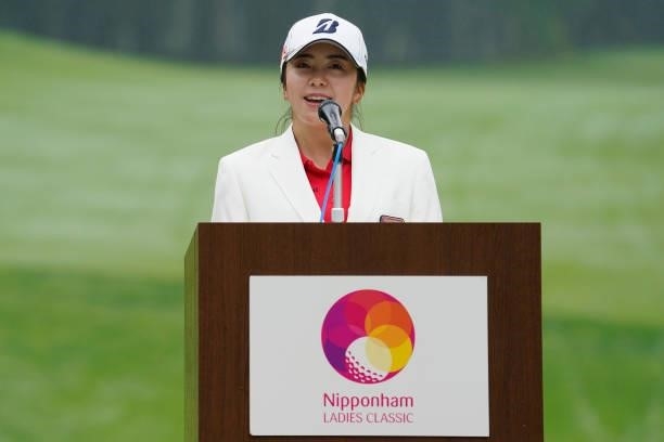 Kotone Hori of Japan speaks at the award ceremony after winning the tournament through the playoff following the third round of the Nipponham Ladies...