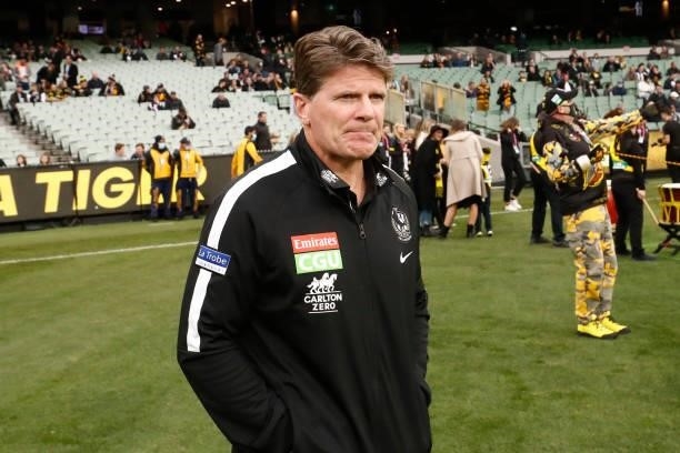 Robert Harvey, Senior Coach of the Magpies walks onto the ground before the round 17 AFL match between Richmond Tigers and Collingwood Magpies at...