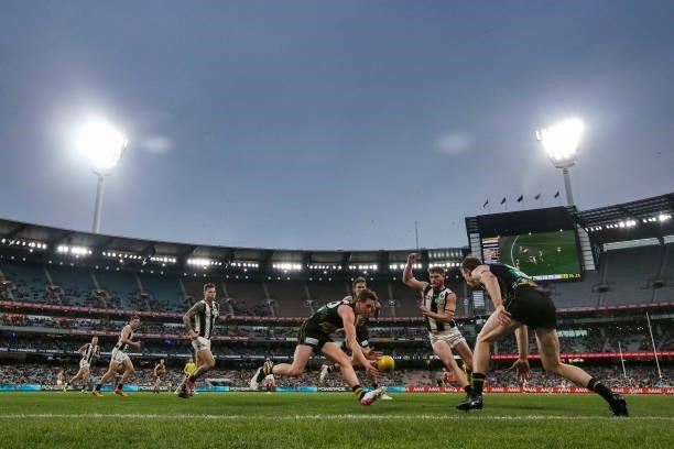 Riley Collier-Dawkins of the Tigers chases the ball during the round 17 AFL match between Richmond Tigers and Collingwood Magpies at Melbourne...