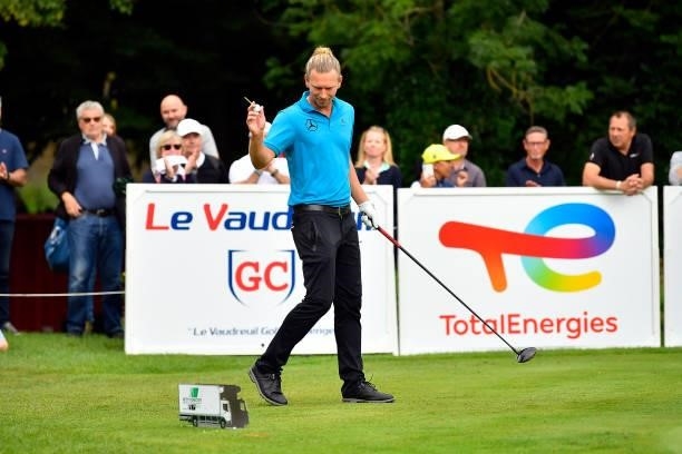 Marcel Siem of Germany reacts after his first shot on the 1st hole during Day Four of Le Vaudreuil Golf Challenge at Golf PGA France du Vaudreuil on...