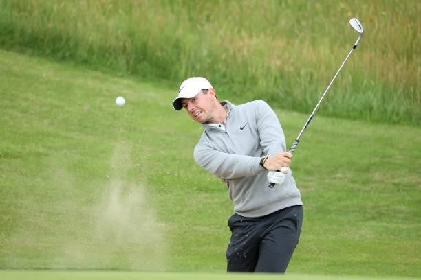 Rory McIlroy of Northern Ireland plays a shot during a practice round for The 149th Open at Royal St George’s Golf Club on July 11, 2021 in Sandwich,...