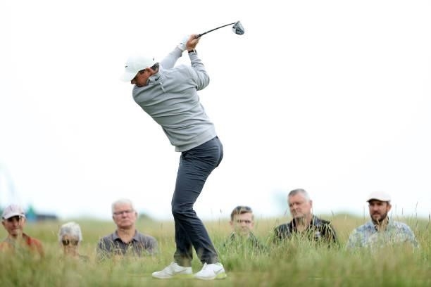 Rory McIlroy of Northern Ireland plays a shot during a practice round for The 149th Open at Royal St George’s Golf Club on July 11, 2021 in Sandwich,...