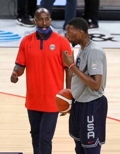Assistant coach Lloyd Pierce of the United States talks with Bam Adebayo as he warms up before an exhibition game against Nigeria at Michelob ULTRA...