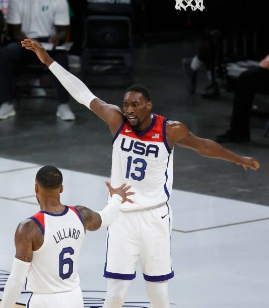 Damian Lillard and Bam Adebayo of the United States react after Adebayo dunked against Nigeria during an exhibition game at Michelob ULTRA Arena...