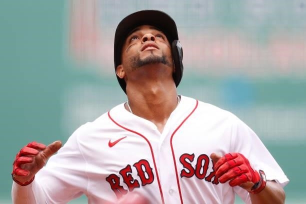 Xander Bogaerts of the Boston Red Sox celebrates after hitting a home run against the Philadelphia Phillies during the second inning at Fenway Park...