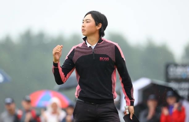 Min Woo Lee of Australia celebrates victory on the18th green after his birdie in the play-off hole during Day Four of the abrdn Scottish Open at The...