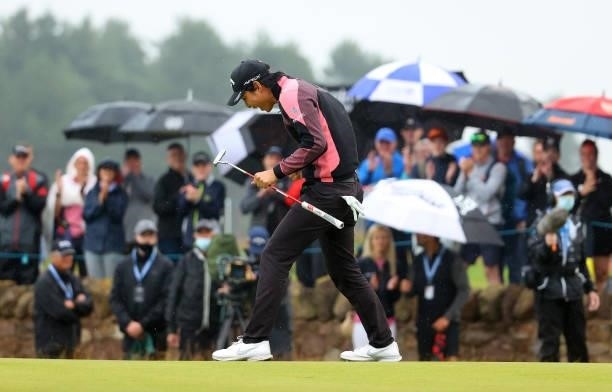 Min Woo Lee of Australia celebrates victory on the18th green after his birdie in the play-off hole during Day Four of the abrdn Scottish Open at The...