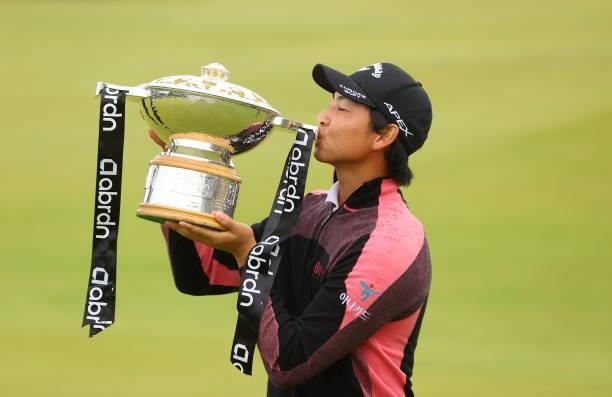 Min Woo Lee of Australia celebrates with the trophy after winning the abrdn Scottish Open at The Renaissance Club on July 11, 2021 in North Berwick,...