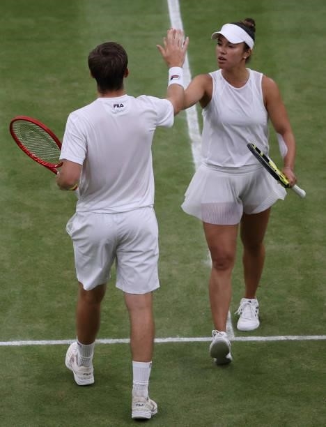 Neal Skupski of Great Britain and Desirae Krawczyk of USA interact during their mixed doubles Final match against Joe Salisbury of Great Britain and...