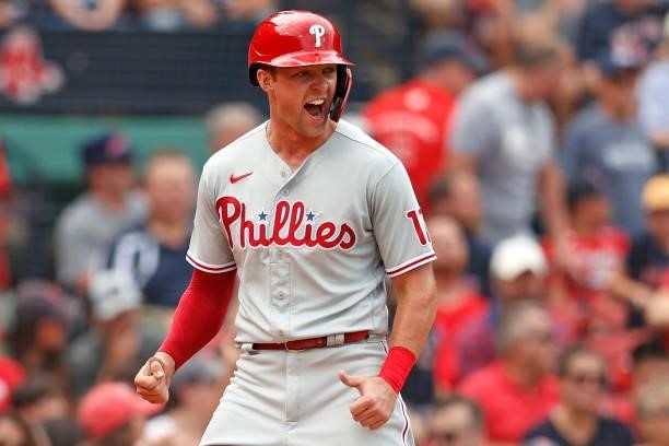 Rhys Hoskins of the Philadelphia Phillies celebrates running towards home after Ronald Torreyes hit a three run home run against the Boston Red Sox...