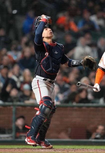 Tres Barrera of the Washington Nationals tracks a pop-up on the infield off the bat of Mike Yastrzemski of the San Francisco Giants in the bottom of...