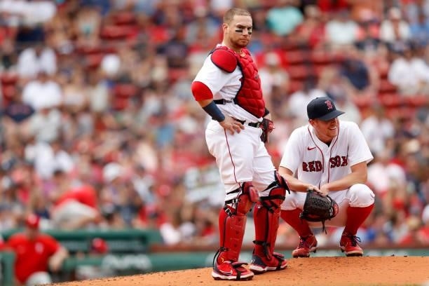 Christian Vazquez of the Boston Red Sox and Nick Pivetta look on from the pitchers mound during the fourth inning against the Philadelphia Phillies...