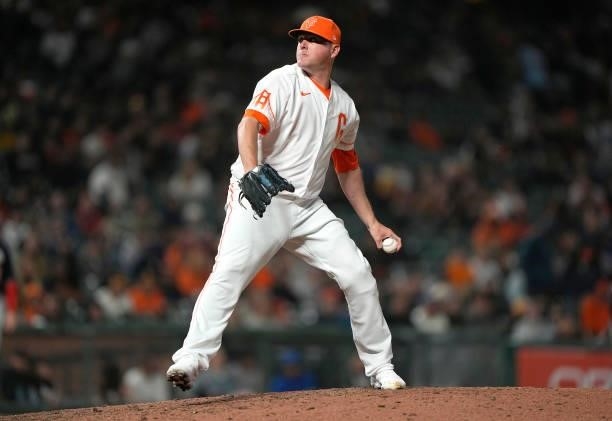 Jake McGee of the San Francisco Giants pitches against the Washington Nationals in the top of the ninth inning at Oracle Park on July 09, 2021 in San...