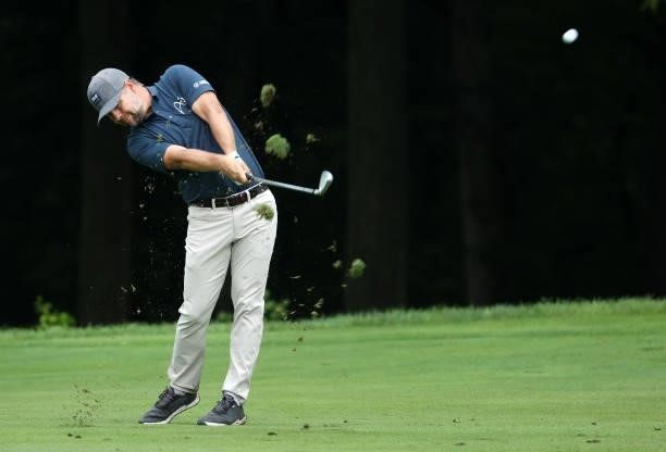 Ryan Moore plays his second shot on the sixth hole during the final round of the John Deere Classic at TPC Deere Run on July 11, 2021 in Silvis,...