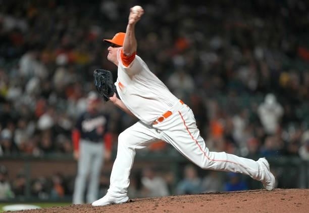 Jake McGee of the San Francisco Giants pitches against the Washington Nationals in the top of the ninth inning at Oracle Park on July 09, 2021 in San...