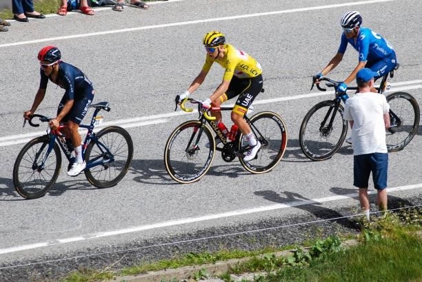 Richard Carapaz, from INEOS Grenadiers, Tadej Pogacar, from UAE Team Emirates, and Enric Mas, from Movistar Team, during the 108th Tour de France...